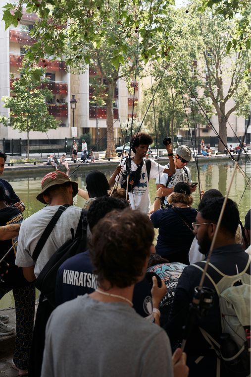 People outside at a fishing event